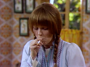 Mary Hartman smokes a cigarette backwards